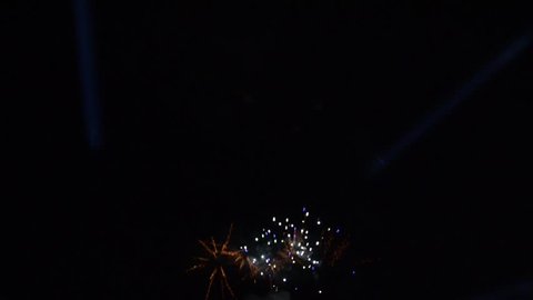 Colorful Firework lights in the night sky. Fireworks show.  New year's eve fireworks. Happy New Year. Pyrotechnics 