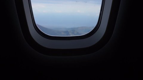 Views of the tambora mountain from behind the windows of airplanes | Slow motion
