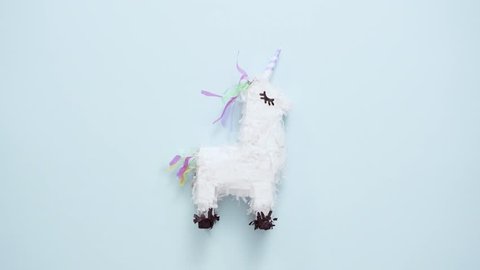 Small unicorn pinata for kids birthday party.