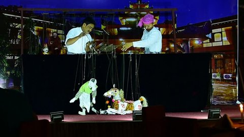 MANDALAY, MYANMAR - DECEMBER15, 2017 : Myanmar men puppeteer playing their puppets at Mandalay, Myanmar in Dec. 15, 2014.