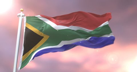 South Africa flag waving at wind in slow at sunset, loop