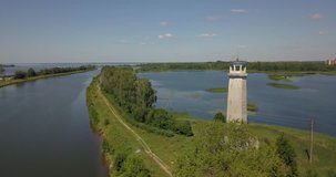 4K aerial video of old concrete Stalin's era structure of Bolshoi Volzskiy mayak (Big Volga Lighthouse) near town Dubna and The Channel of Moscow around 100 km north of Moscow, the capital of Russia