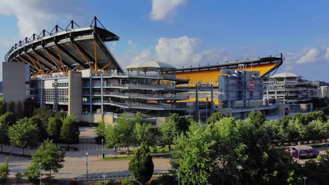 PITTSBURGH, PA - Circa August, 2018 - A reverse rising aerial establishing shot of Heinz Field, home to the Pittsburgh Steelers.  	