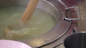Blanched noodles in a large pot. For the restaurant. Video clip at Bangkok Thailand.