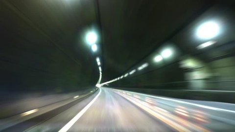Speed motion in road tunnel :
Car POV shot : Blurred motion tunnel. Shot from a slow moving car
