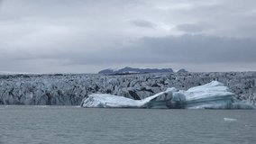 Boat tour in the Jokulsarlon glacier lagoon (Iceland) with a lot of Icebergs (4K)