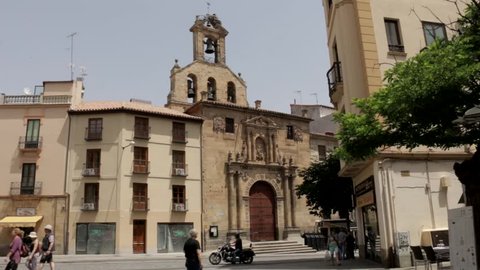 Salamanca, Spain - August 2018: People walking outside San Martin De Tours Church.