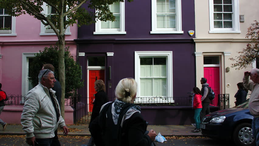 London, England - October 30 2017: Notting Hill colorful houses timelapse. Portobello Road
