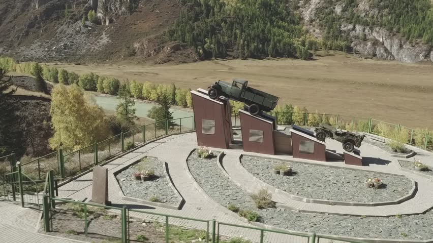 vintage cars, river, hills