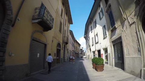 Albino, Bergamo, Italy. August 10, 2018. Driving shot, vehicle point of view. Camera on car roof. Driving through the streets of the city