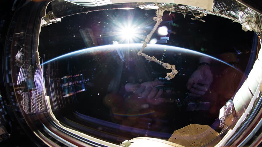 Earth as seen through window of International Space Station ISS . Elements of this image furnished by NASA.