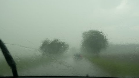 driving a car, downpour, heavy rain, driver's and passenger's perspective