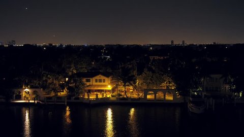 Aerial Miami luxury mansion at night