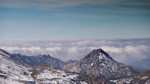 timelapse above the clouds of the sierra nevada mountains near to granada in spain