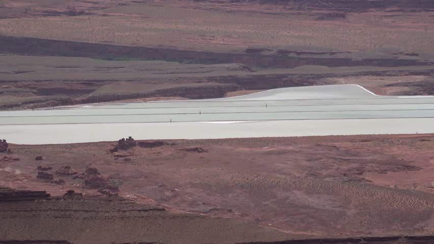 Salt lake at the bottom of the canyon, mountain landscape, Canyonlands National Park, Utah. Nature of the USA