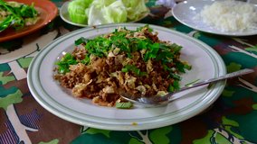 4K time lapse video of northern Thai style spicy minced pork, Thailand.