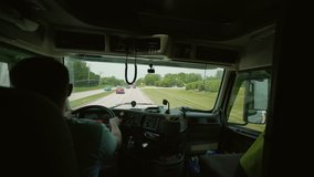 Driving Truck. Truck Driver Delivering Freight. inside the cabin rotate camera