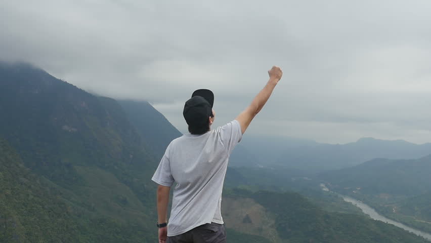 Vitory Young Man On The Top Of Mountain
