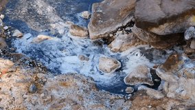 4K video of water flowing in Chae Son hot spring, Thailand.