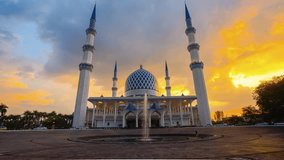 4K Timelapse of Shah Alam beautiful mosque during sunset. Tilt Up effect