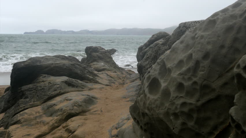 Walking away from the Ocean in Cloudy day