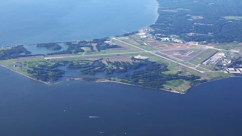 Patuxent River Naval Air Base, 4k aerial overview on a clear spring morning.