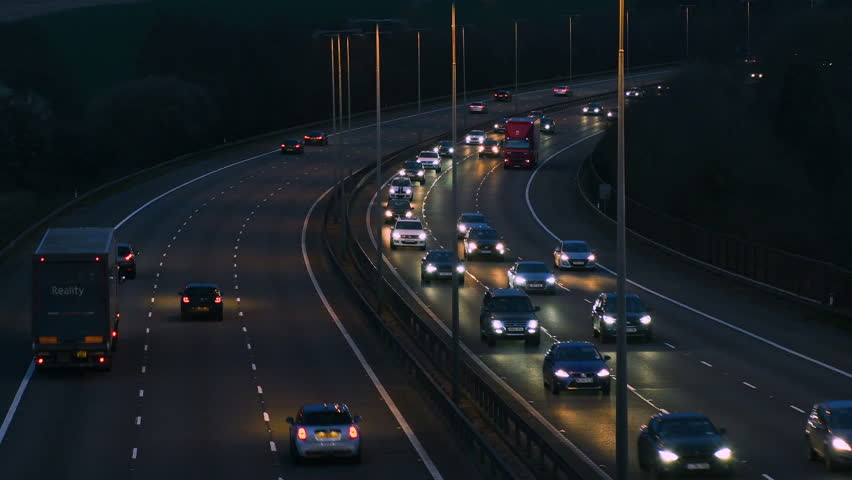 Busy motorway traffic in the UK 4K Royalty-Free Stock Footage #1014984064