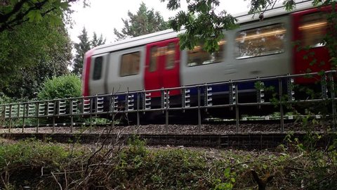 London Underground S8 train passing by on the Metropolitan line