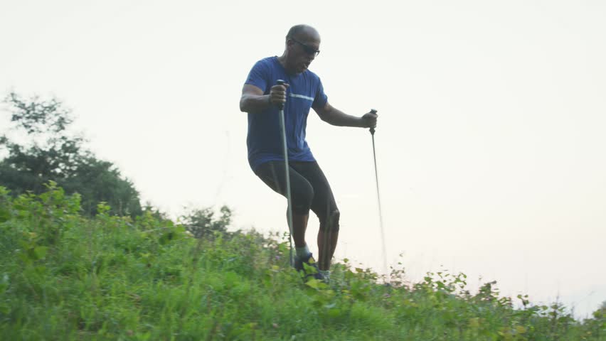 Man Running Downhill With A Beautiful View