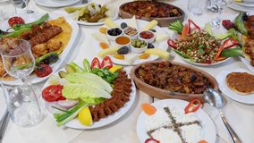 Traditional assorted turkish dishes. Table full of Restaurant food. Video 4K