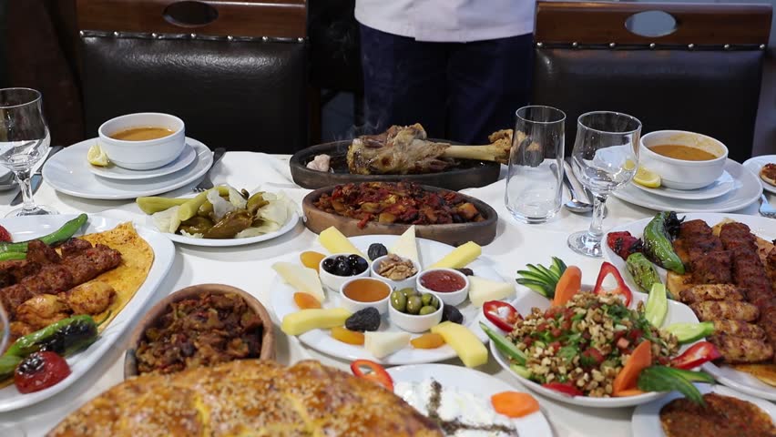 Traditional assorted turkish dishes. Table full of Restaurant food. Video 4K