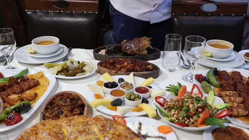 Traditional assorted turkish dishes. Table full of Restaurant food. Video 4K