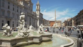 The Moor Fountain in the Piazza Navona in Rome. Defocused background of statues on the Fontana del Moro in Italian square plaza