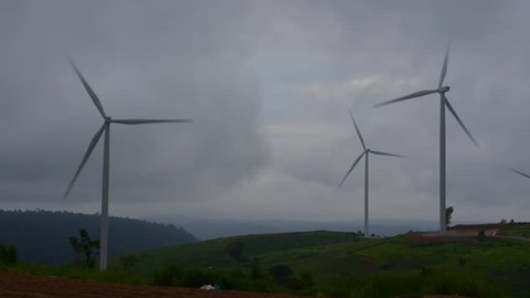 HD 1080 Wind turbine in the field at Storm  clouds