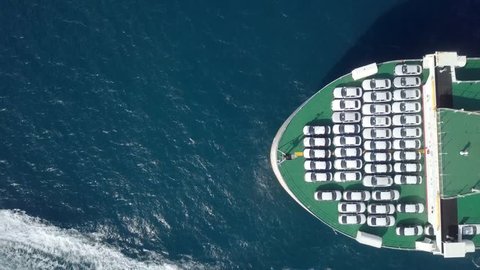 Aerial footage of a Large RoRo (Roll on/off) Vehicle carrie vessel cruising the Mediterranean sea