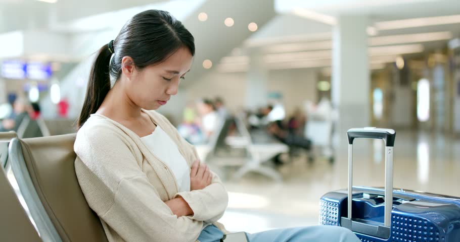 Woman sleeping in the airport
