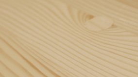 Tilting on flat sawn wood grain texture 4K video