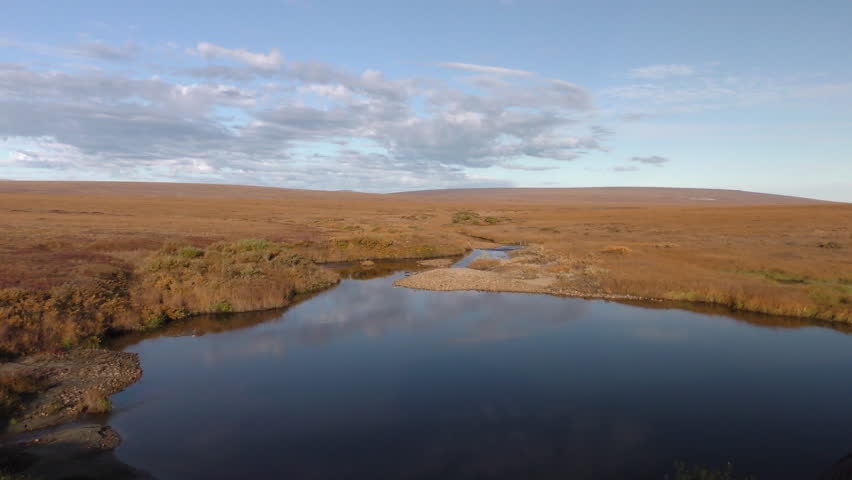 Tundra Seward Peninsula in Fall Water Pond in Alaska