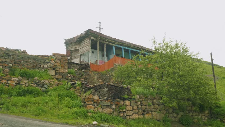 View of old mountain village with its buildings and masonry