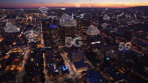 Aerial city connected through 5G. Wireless network, mobile technology concept, data communication, cloud computer, artificial intelligence, internet of things. Los Angeles skyline. Futuristic city.