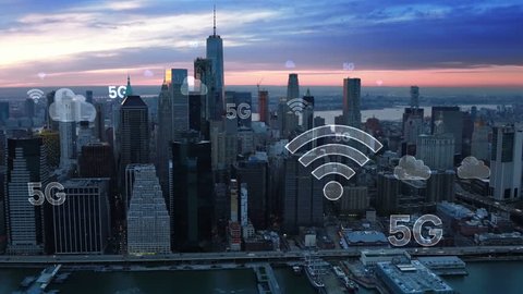 Aerial city connected through 5G. Wireless network, mobile technology concept, data communication, cloud computer, artificial intelligence, internet of things. New York City skyline. Futuristic city.