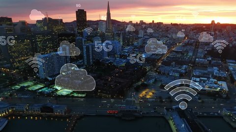 Aerial city connected through 5G. Wireless network, mobile technology concept, data communication, cloud computer, artificial intelligence, internet of things. Futuristic city. San Francisco skyline.
