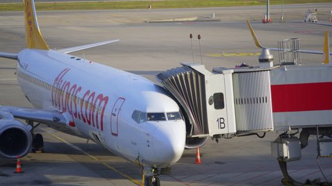 TURKEY - CIRCA MAY 2017 - Skybridge deployed, airplane arrival boarding, Ataturk Airport, Istanbul