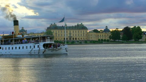 Drottningholm, Sweden - AUGUST 15, 2018: Steamboat trafficing Drottningholm Palace, Stockholm, Sweden.