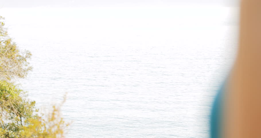 Young adult female checking progress of her recreation activities on her smart watch, focus pull