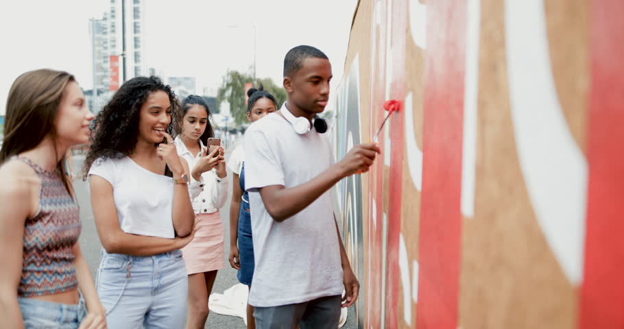 Group of teenagers working together on a community project