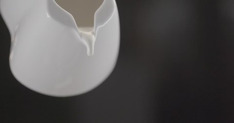 milk pouring from a jug