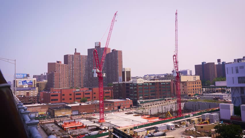 NYC constuction shot with two cranes