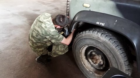 Sirnak, Turkey, June 15th 2016, Iraq-Turkey Border: Mechanics repairing army vehicles in army base.