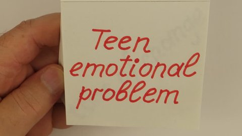 Lecturer  psychologist reviews the entries of the lecture on the topic of “Teen emotional problem”, white background